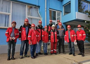 Part of our team in front of a VARD building